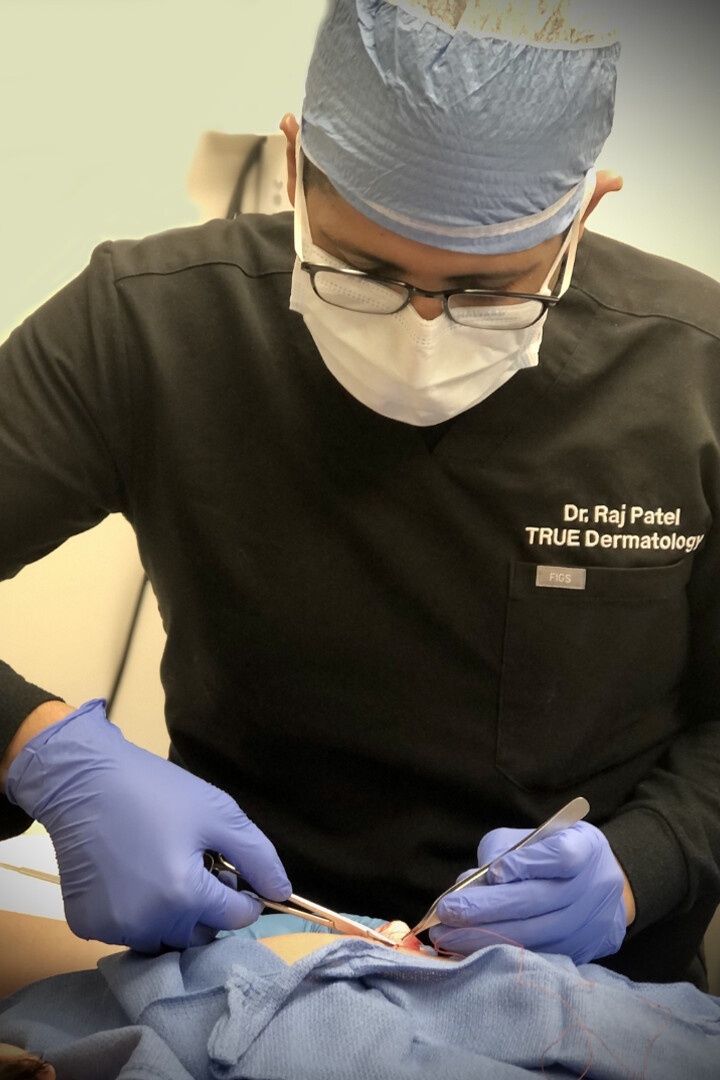 Dr. Patel conducts skin cancer surgery at True Dermatology